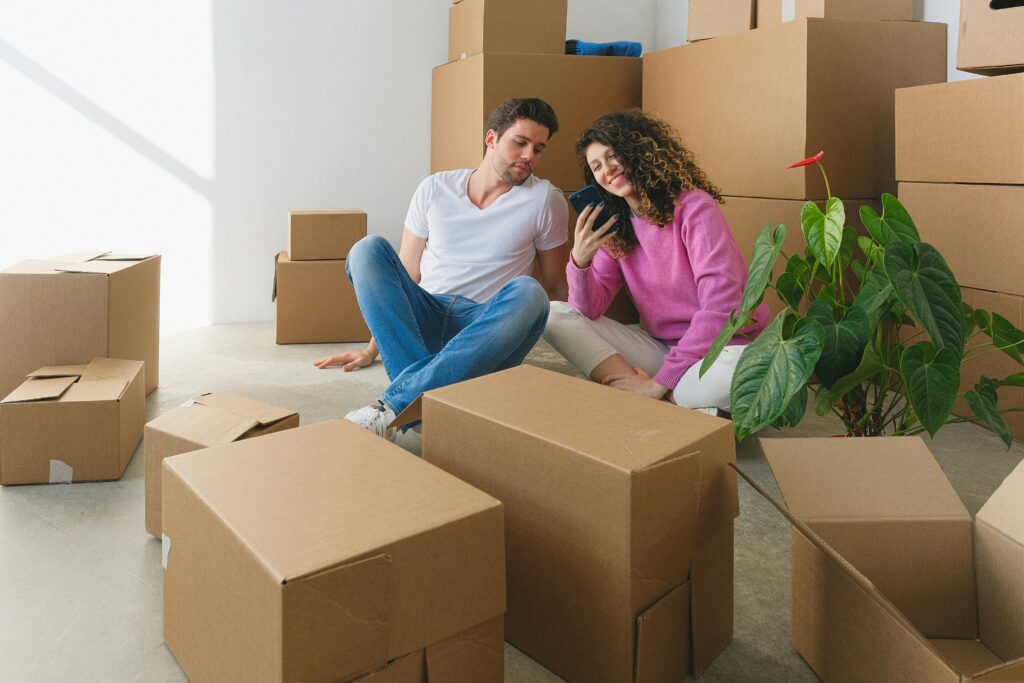 AI moving app inventory screen on smartphone during a home move